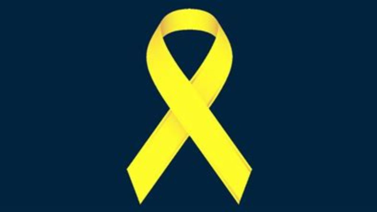 Yellow ribbon, navy background